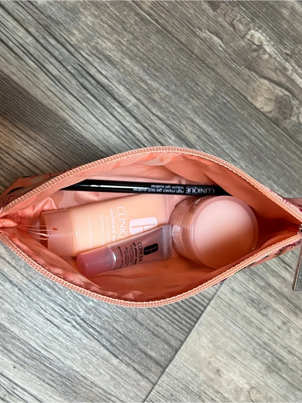 CLINIQUE Travel Bundle - Moisture Surge Hydrators, Eye Serum, Gel Eyeliner + Bag